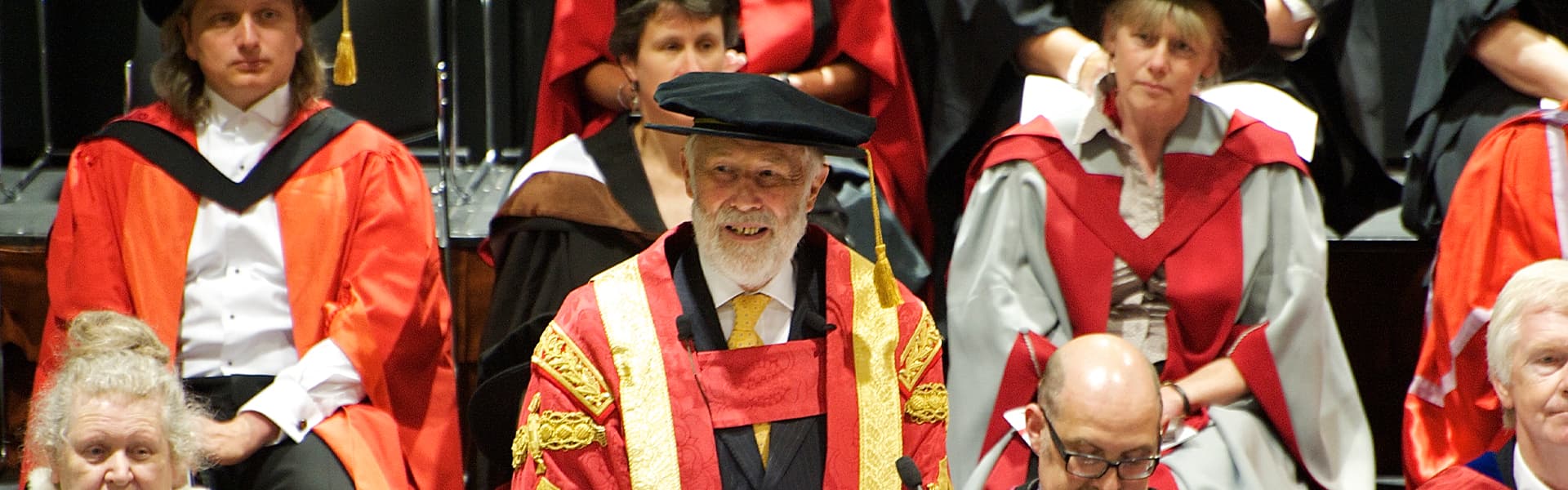 Chris Bonington in cap and gown at a graduation ceremony