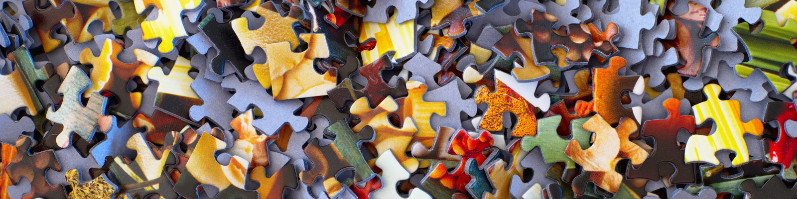 Multi-coloured jigsaw puzzle pieces