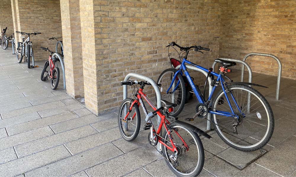 bikes parked under cover at Frness Quad using standard cycle stands.