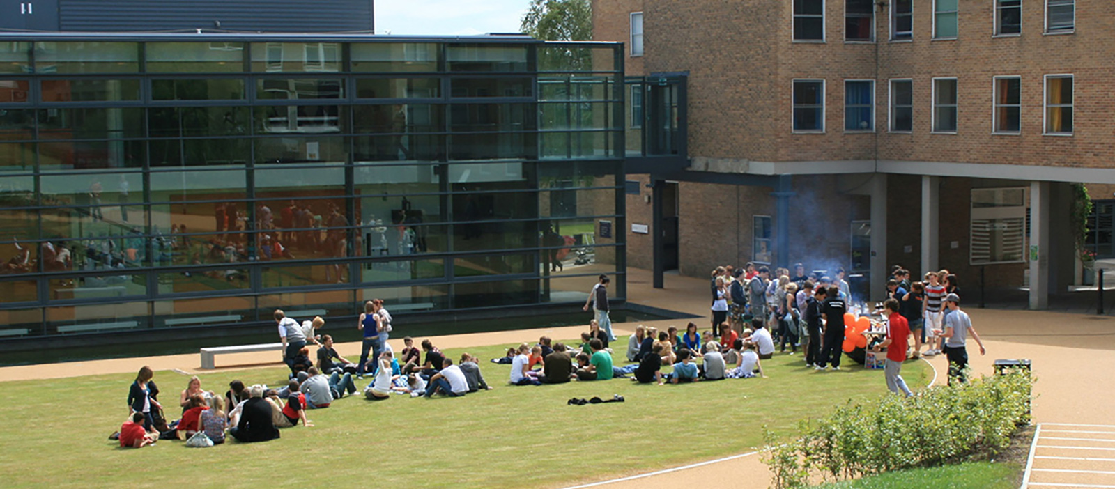 Students at a barbecue outside Fylde College