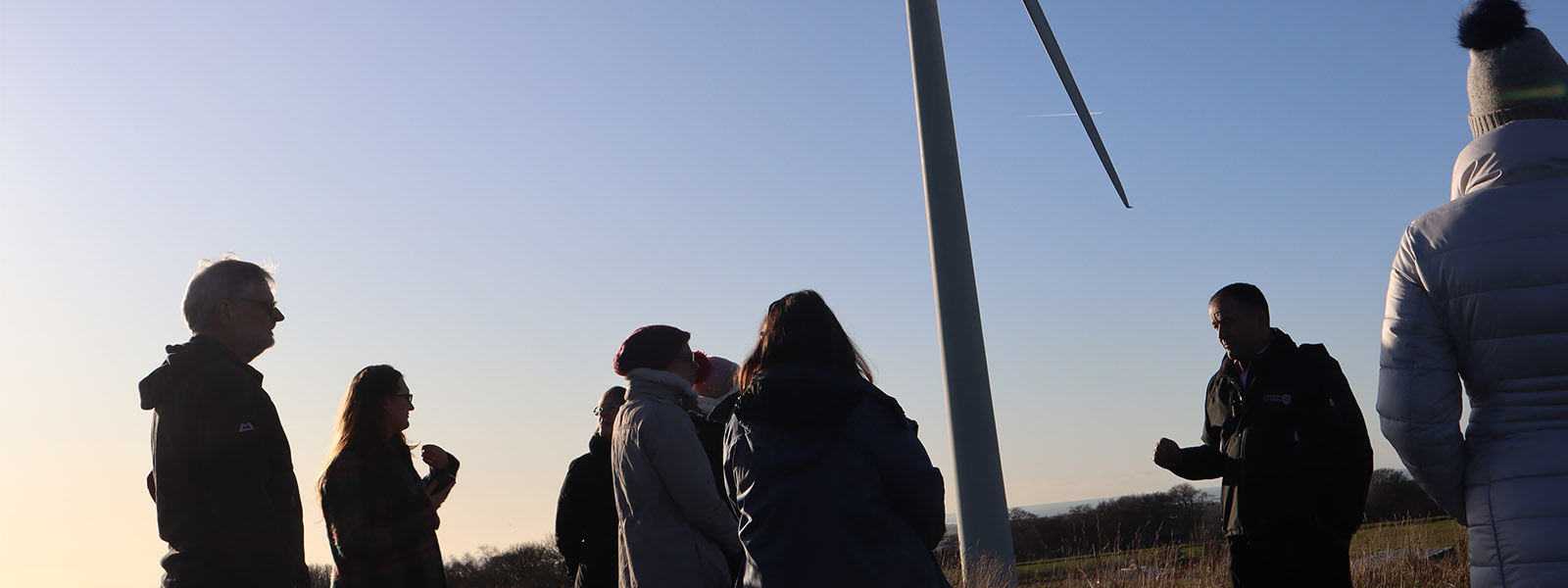 The Sustainability Manager hosting a tour of the wind turbine